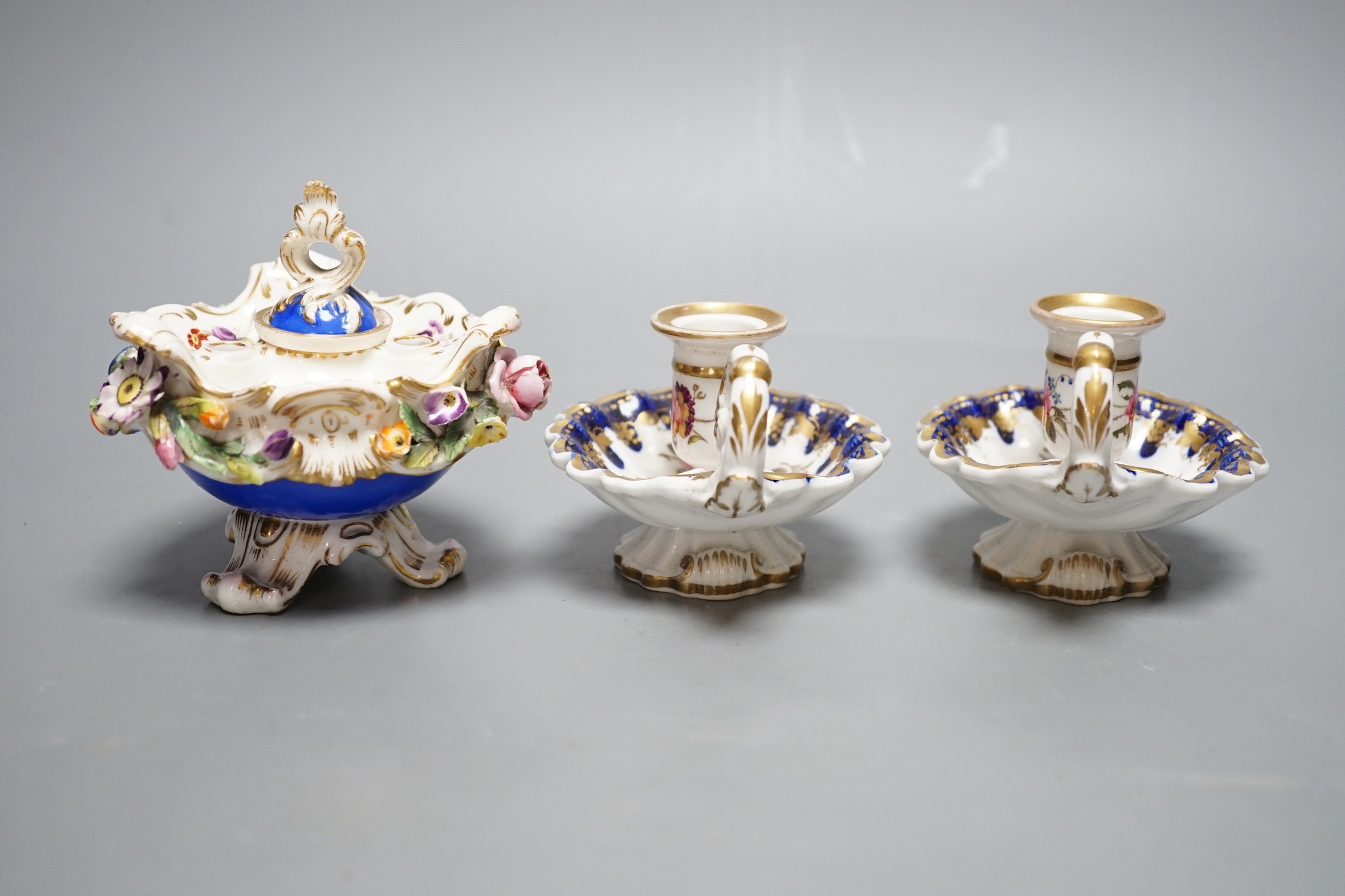 A Coalport floral encrusted inkwell cover and liner, marked C-Dale in blue and two English porcelain tapersticks painted with roses perhaps Coalport, c.1820